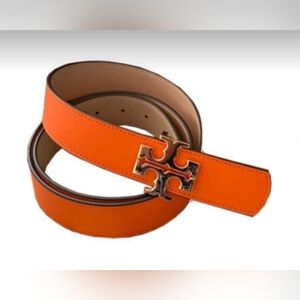 Tory Burch Kira 1" reversible belt in orange and tan with gold logo. Sz Med.